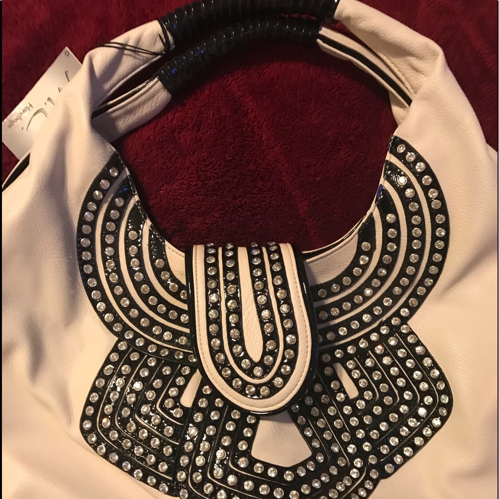 👜New handbag with tags by M. C Designer.